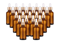 Χρυσά μπουκάλια γυαλιού ΚΑΠ κενά για τη χρήση προσωπικής φροντίδας ουσιαστικών πετρελαίων