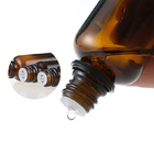 Κενό ηλέκτρινο καλλυντικό μπουκάλι γυαλιού ουσιαστικού πετρελαίου με την πλαστογράφηση εμφανής ΚΑΠ