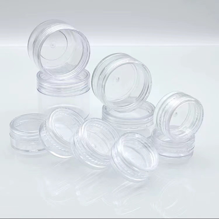 Διαφανές καλλυντικό πλαστικό βάζο κρέμας με την κεφαλή κοχλίου